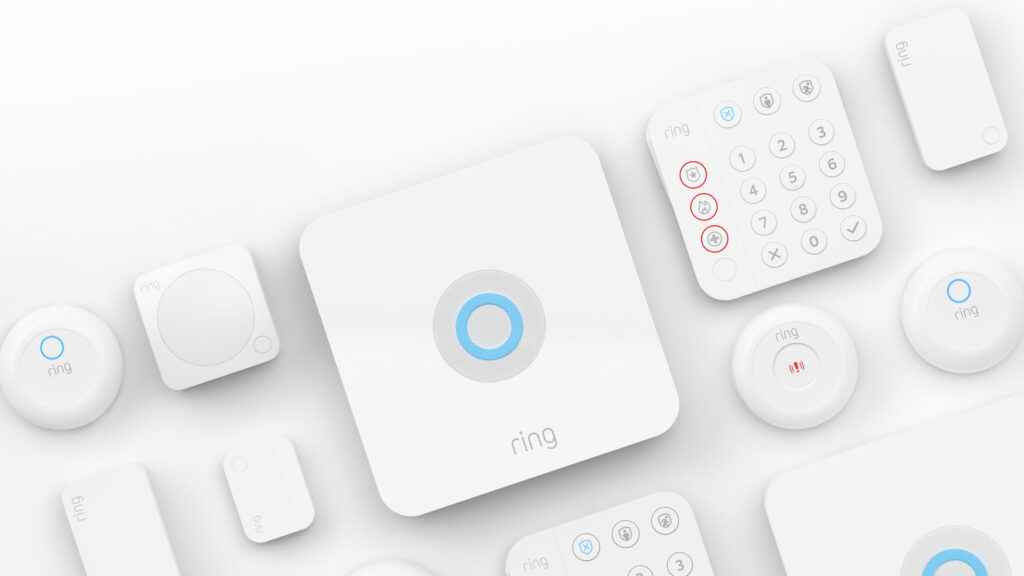 Ring alarm generation 2 with keypads and sensors laid out on table.