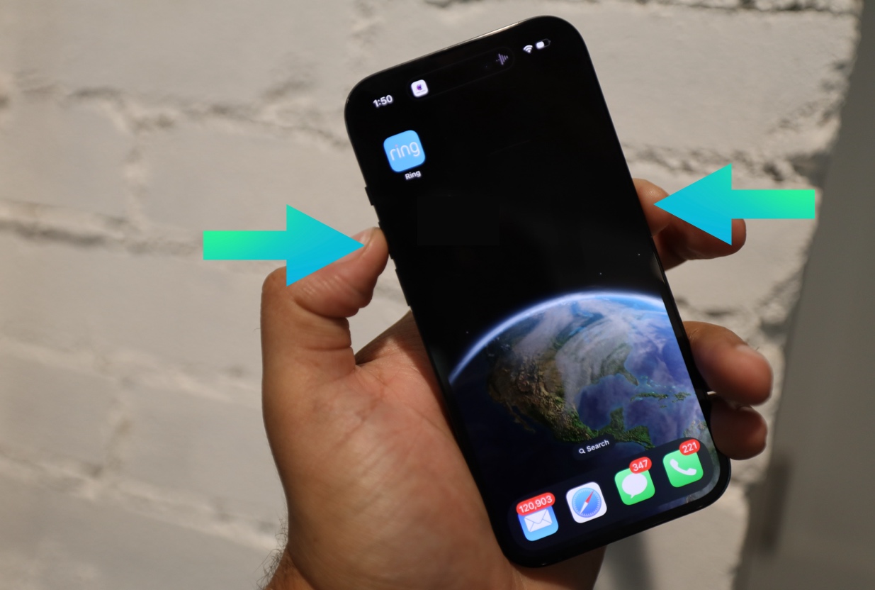 Press and hold buttons on side of iPhone