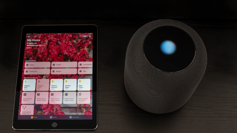 apple homepod homekit next to a smartphone