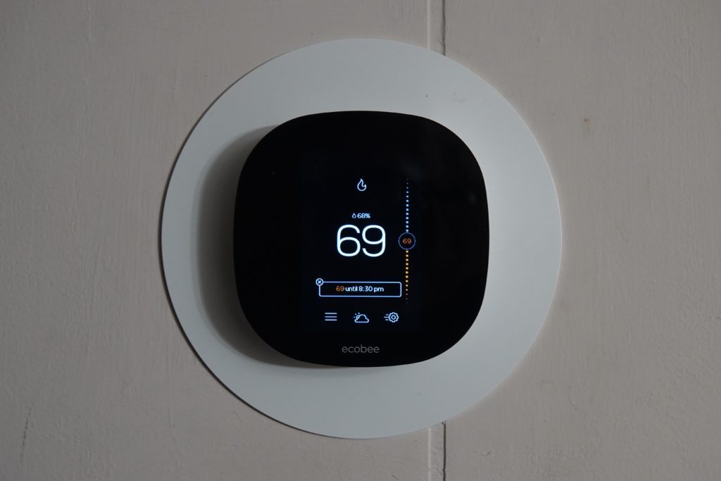 Ecobee thermostat on wall