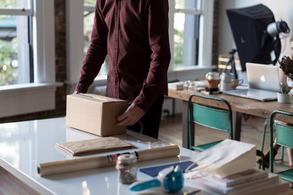 Man packing up box