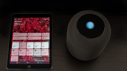 apple homepod homekit next to a smartphone