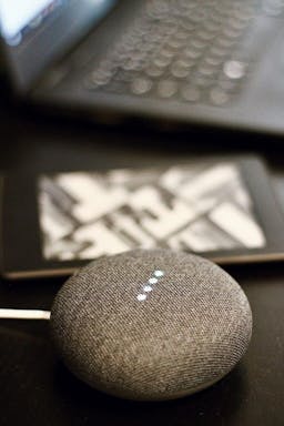 Echo Dot and smart phone on desk