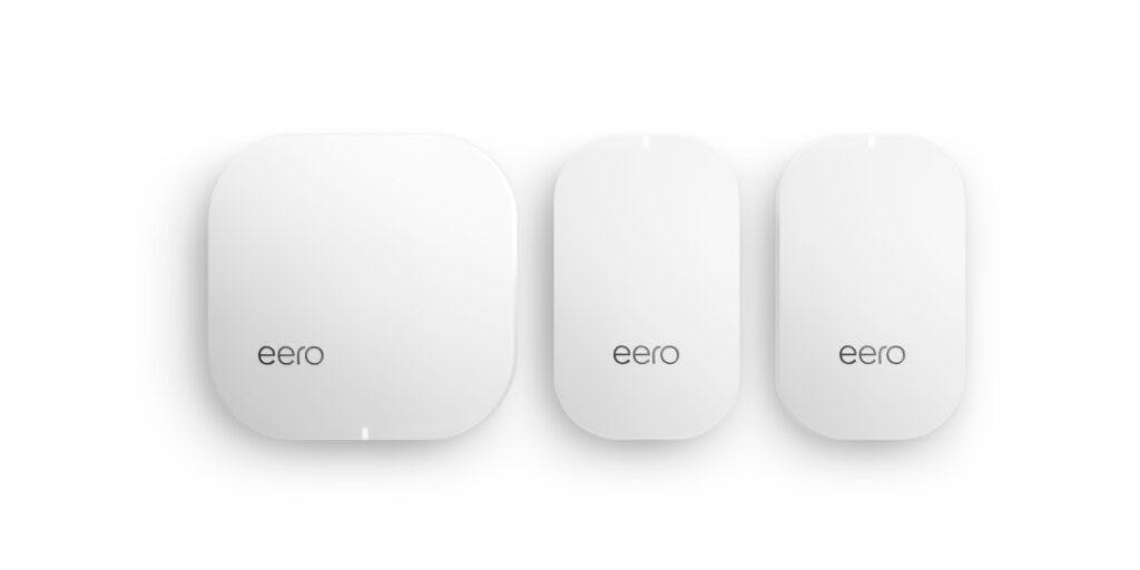 eero wifi system on white table