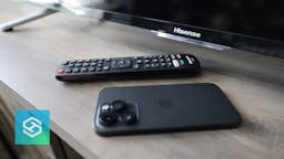 iphone next to Hisense tv